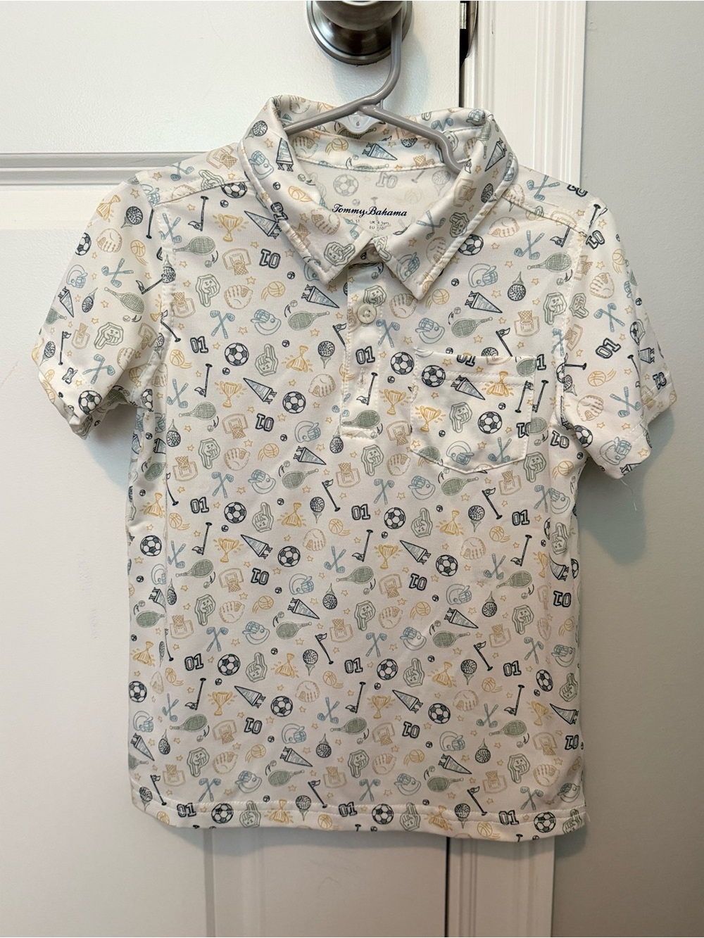 Tommy Bahama Boys White Polo with Blue, Green & Yellow Sport Icons